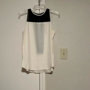 Parker silk sleeveless top. Size Small. White with sheer black. Pure silk.